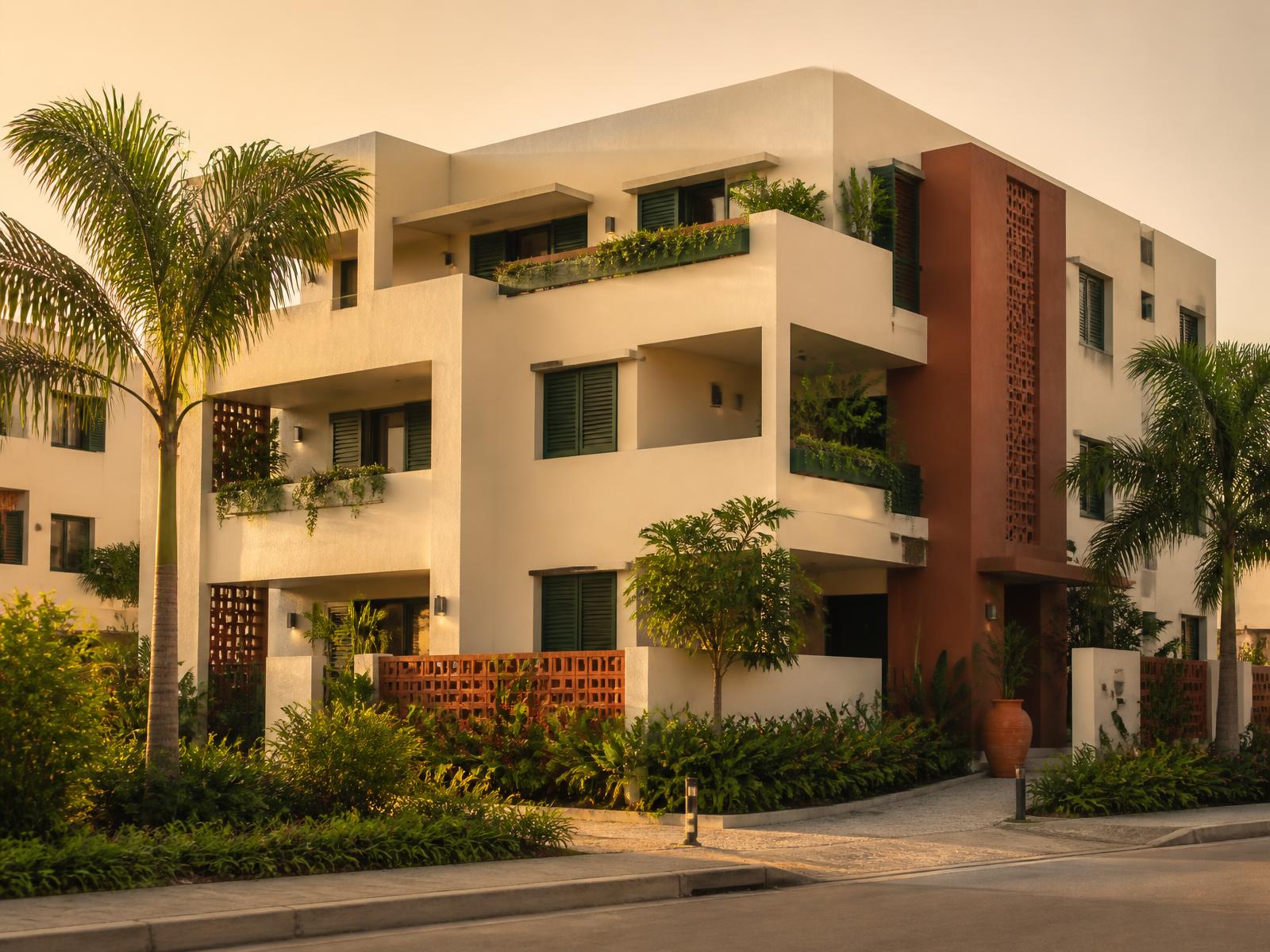 Modern rental apartment building in Lomé at golden hour